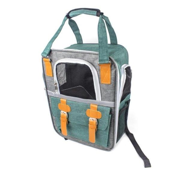 Imagen que muestra el producto Bolso Transportador De Mascotas. Maleta con visor en malla y cremallera, bolsillo delantero con correas y broche con iman, bolsillos laterales en malla y tapete interno que brinda mayor estabilidad. Se puede llevar como bolso o maleta. Material: Mezclilla, malla, metal                                                                                                     Color: Verde, azul, amarillo                                                                                                            Disponible: Razas pequeñas de hasta 10-15 kg