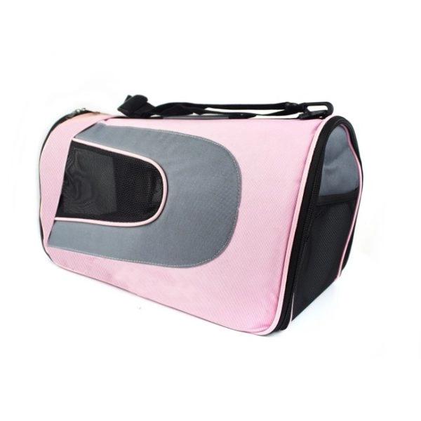 Imagen que muestra el producto Bolso Unicolor Para Mascotas. Guacal de tela con visores laterales en malla, cuenta con tapete y correa. Material: Poliéster Color: Rosado, azul Disponible: Razas pequeñas