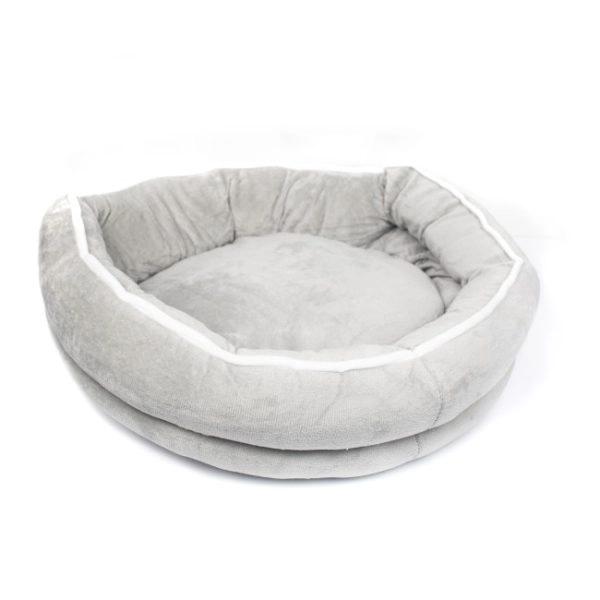 Imagen que muestra el producto Cama Redonda Unicolor Para Mascotas. Cama redonda tipo cuna para mascotas. Material: Poliéster Color: Palo rosa, gris DIsponible: Razas pequeñas y medianas.