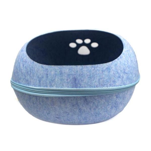 Imagen que muestra el producto Cama Semicerrada Para Mascotas. Cama semicerrada con cremallera para desmontar facilmente. Trae colcha. Material: Fieltro semiduro Color: Disponible en la foto Disponible: Razas pequeñas.