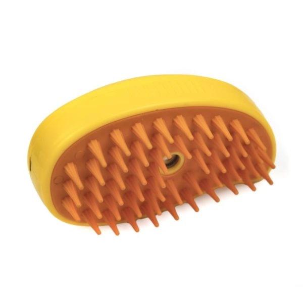Imagen que muestra el producto Cepillo A Vapor Para Mascotas. Cepillo a vapor para mascotas, cuenta con puerto de carga y cable USB. Agregue agua o perfume para mascotas y oprima el boton. Material: Plástico, silicona  Color: Verde, amarillo  Disponible: Razas pequeñas y medianas con pelaje largo.