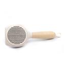 Imagen secundaria del producto Cepillo Cabezal De Gatito Para Mascotas. Cepillo de cabeza redonda en forma de gato, cuenta con cerdas de metal, mango antideslizante y botón en la parte trasera para expulsar el pelo. Material: Metal, madera                                                                                                                       Color: Amarillo, blanco                                                                                                    Disponible: Razas pequeñas y medianas con pelaje largo.