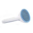 Imagen que muestra el producto Cepillo Cabezal Ovalado Para Mascotas. Cepillo con cerdas de metal, mango antideslizante y botón trasero para expulsar el pelo.  Material: Metal, plástico                                                                                                 Color: Gris, azul, rosado                                                                                                          Disponible: Razas pequeñas y medianas con pelaje largo.