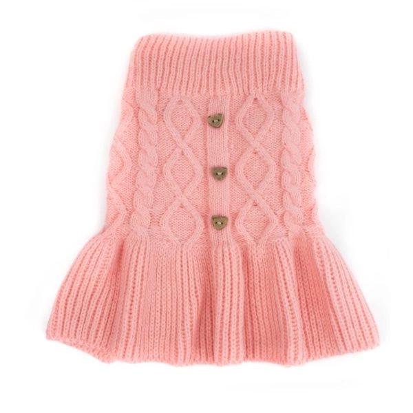 Imagen que muestra el producto Vestido Tejido Botones De Corazón. Vestido unicolor cuello tortuga. Material: Poliéster Color: Rojo, rosado, morado Disponible: Razas pequeñas y medianas.