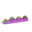 Imagen que muestra el producto Jugueteb Set X3 3 Catnip  Para Mascotas. Set x 3 bolitas de catnip, cuenta con caramelo y adhesivos para pegar a superficies planas. Material: Catnip, caramelo para gatos Color: Verde, morado, azul Disponible: Razas pequeñas.