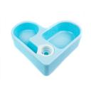 Imagen secundaria del producto Comedero Corazón Con Botella Para Mascotas. Comedero para mascotas en forma de corazón, cuenta con dos compartimentos para agua y comida y una botella dispensadora. Material: Plástico Color: Rosado, verde, azul Disponible: Razas pequeñas. Medidas:  Largo 20 cm* Ancho 20 cm*Alto 5.5 cm