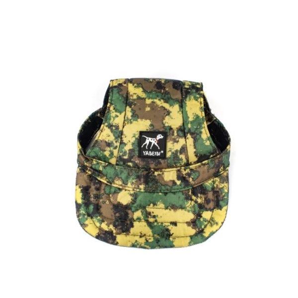 Imagen que muestra el producto Gorra Militar Para Mascotas. Gorra para mascotas con estampado militar, cuenta con dos orificios por los que podrá sacar las orejas y tirilla de tela con pieza de metal para ajustar a la medida,  Material: Póliester, metal                                     Color: Verde militar.                                                                             Disponible: Razas medianas