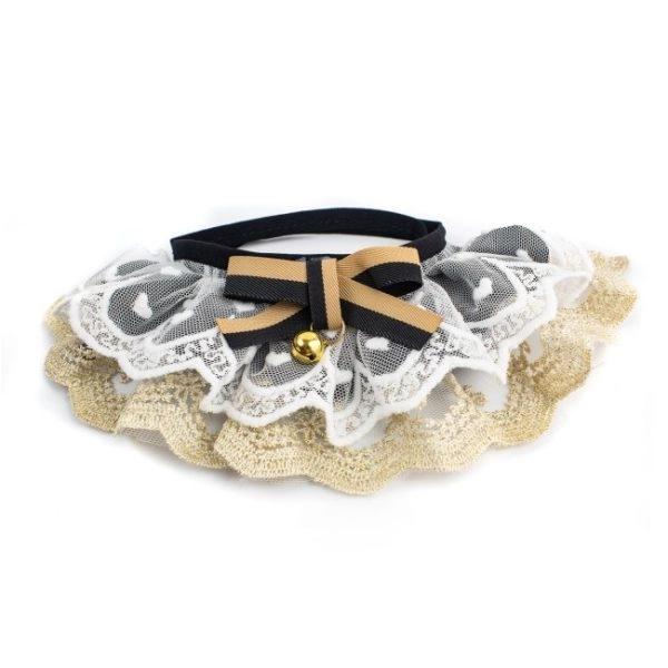 Imagen que muestra el producto Cuello Con Moño Para Mascotas. Collar con moño en el centro y cinta de tela ajustable.  Material: Poliéster   Color: morado, rosado, negro  Disponible: Razas pequeñas Medidas: Talla S : Largo20 cm *Ancho 8 cm  Talla M: Largo25 cm *Ancho11 cm