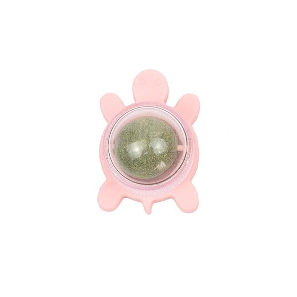 Imagen que muestra el producto Juguete Capnit Tortuga. Juguete tortuga con bola de catnip, cuenta con adhesivo doble para fijar a superficies planas. Material: Plástico Color: Disponible en la foto. Disponible: Razas pequeñas