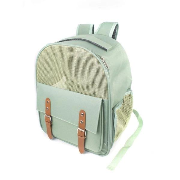 Imagen que muestra el producto Maleta De Transporte Para Mascotas. Maleta con ventana delantera y lateral en malla, bolsillo grande con correas y broche de metal con iman. Trae tapete interno que brinda mejor estabilidad. Material: Mezclilla                                                                                                     Color: Blanco, verde, azul                                                                                                                     Disponible: Razas pequeñas de hasta 10-15 kg