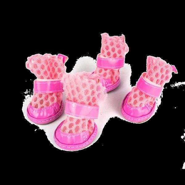 Imagen que muestra el producto Zapatos De Tela Suela Maciza Para Mascotas. Zapatos para mascotas, cuenta con malla antitranspirante, velcro ajustable y almohadillas rigidas. Talla 1. Talla 2 Material: Poliéster, sintético Color: Verde, rosado, azul, negro Disponible: Razas pequeñas. Medidas: Talla 1 : Largo4 cm * Ancho 5.5 cm Talla 2: Largo 5.5cm * Ancho 4cm